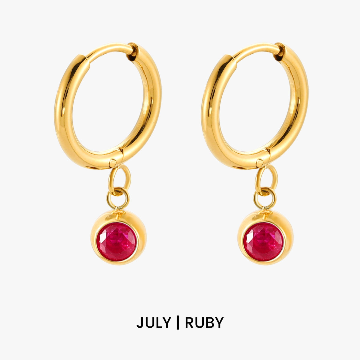 Aros con dije de piedra de nacimiento
