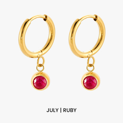 Aros con dije de piedra de nacimiento