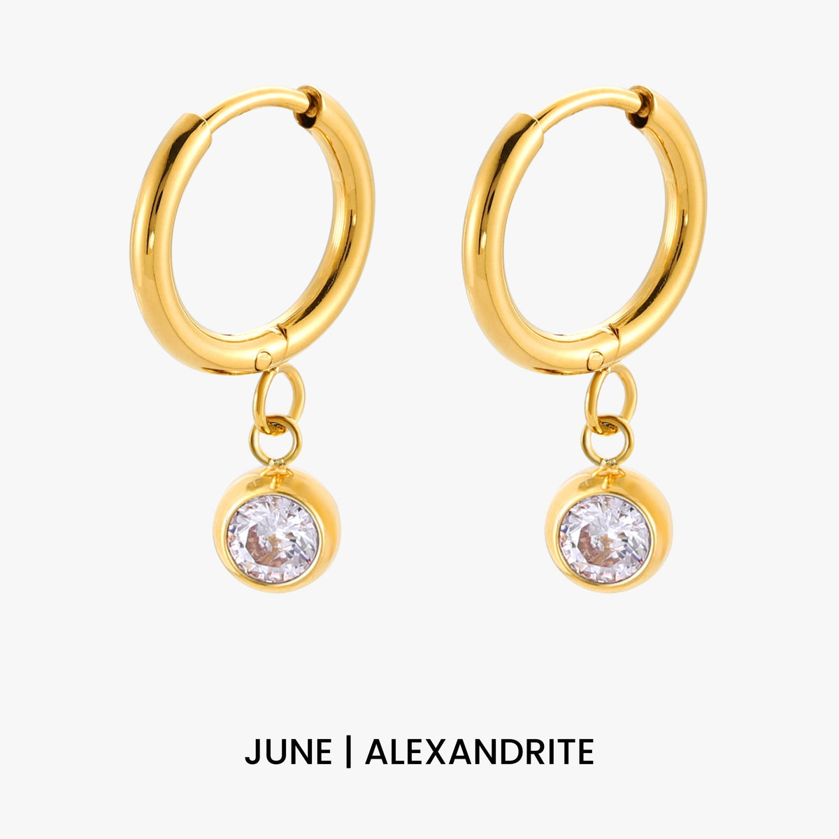Aros con dije de piedra de nacimiento