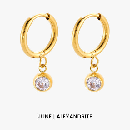 Aros con dije de piedra de nacimiento