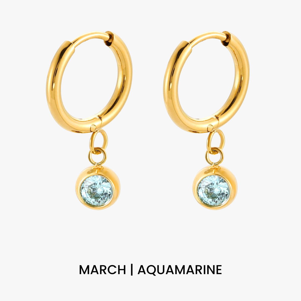 Aros con dije de piedra de nacimiento