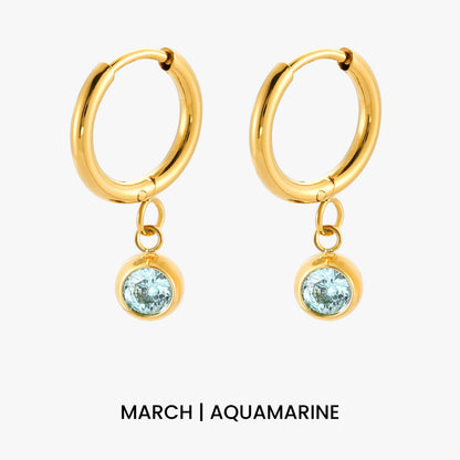Aros con dije de piedra de nacimiento
