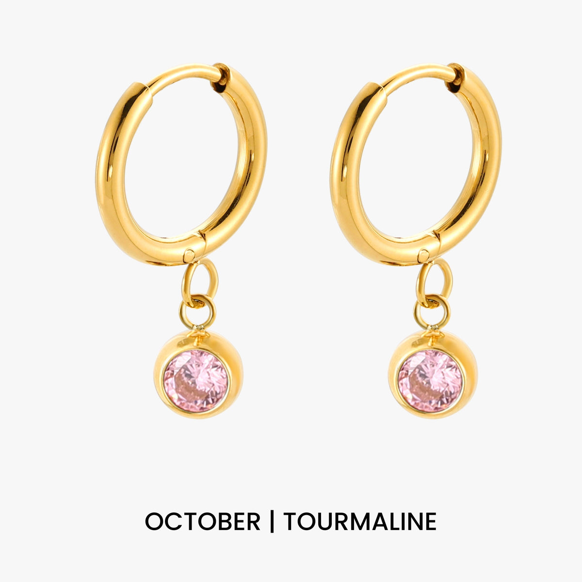 Aros con dije de piedra de nacimiento